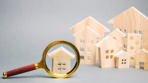 house with magnifying glass