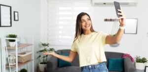 woman showing off apartment on phone