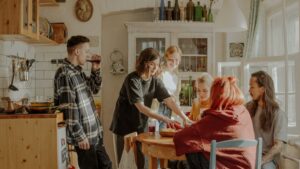 group of friends hanging out in the kitchen