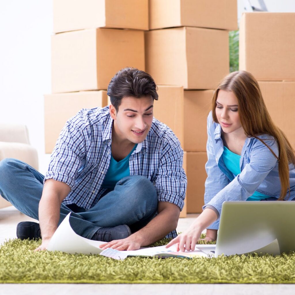 couple working on moving plan