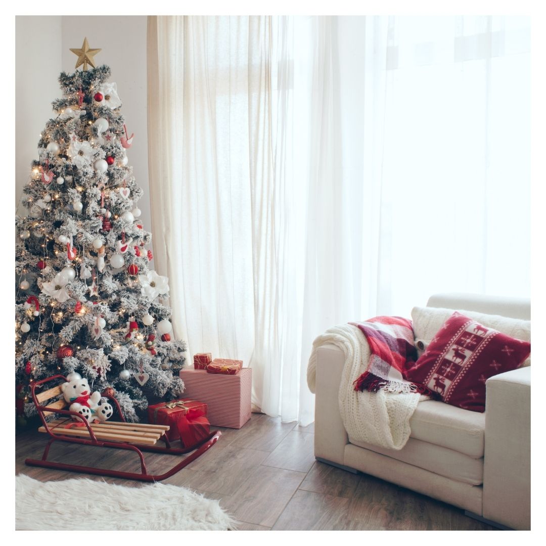 holiday pillow and blankets on a chair