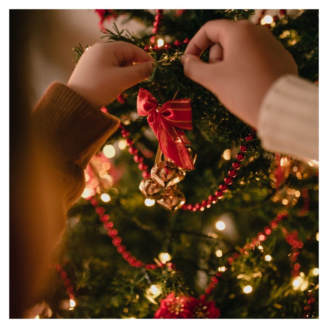 red decorations on a Christmas tree