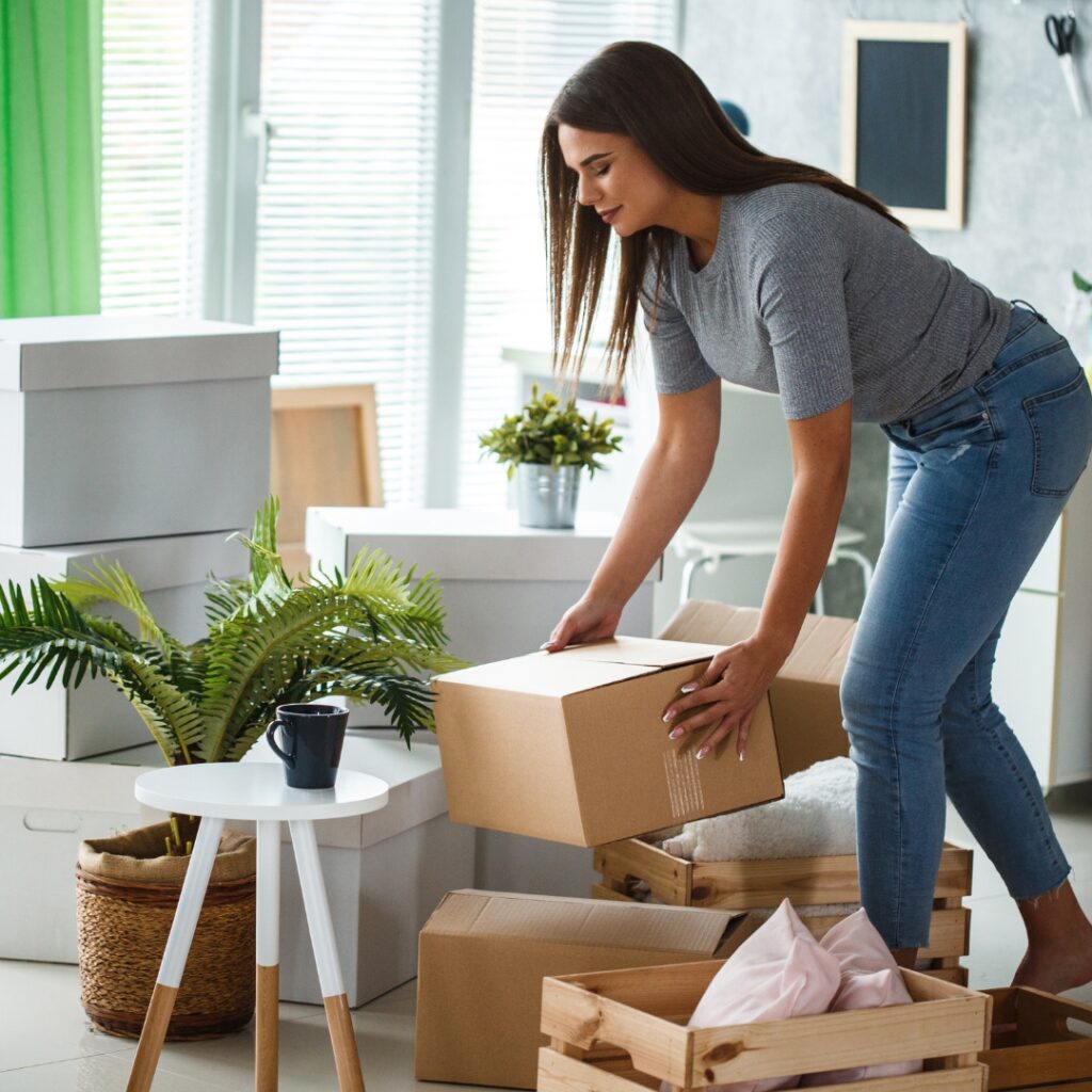 woman holding an essentials box