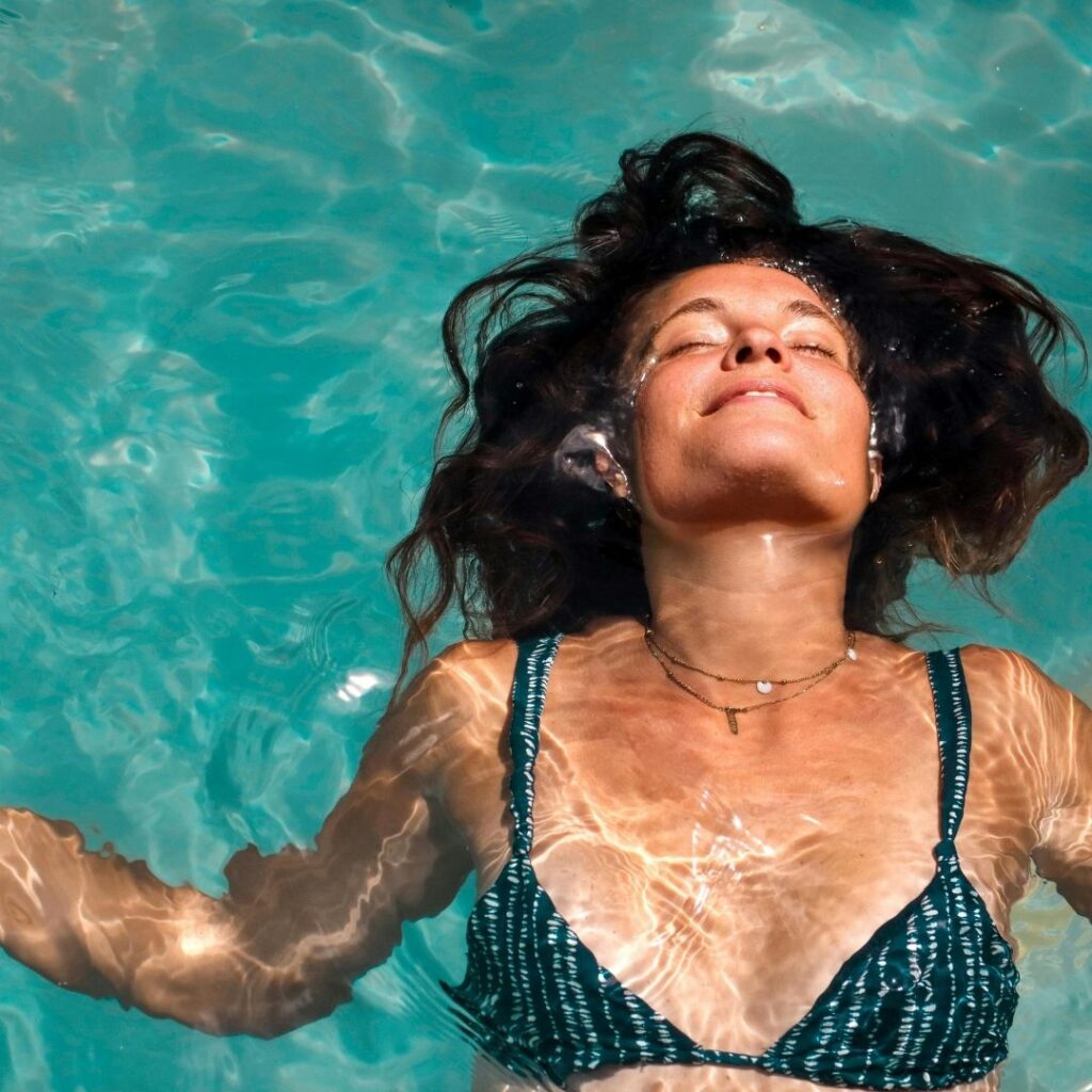 woman relaxing in pool